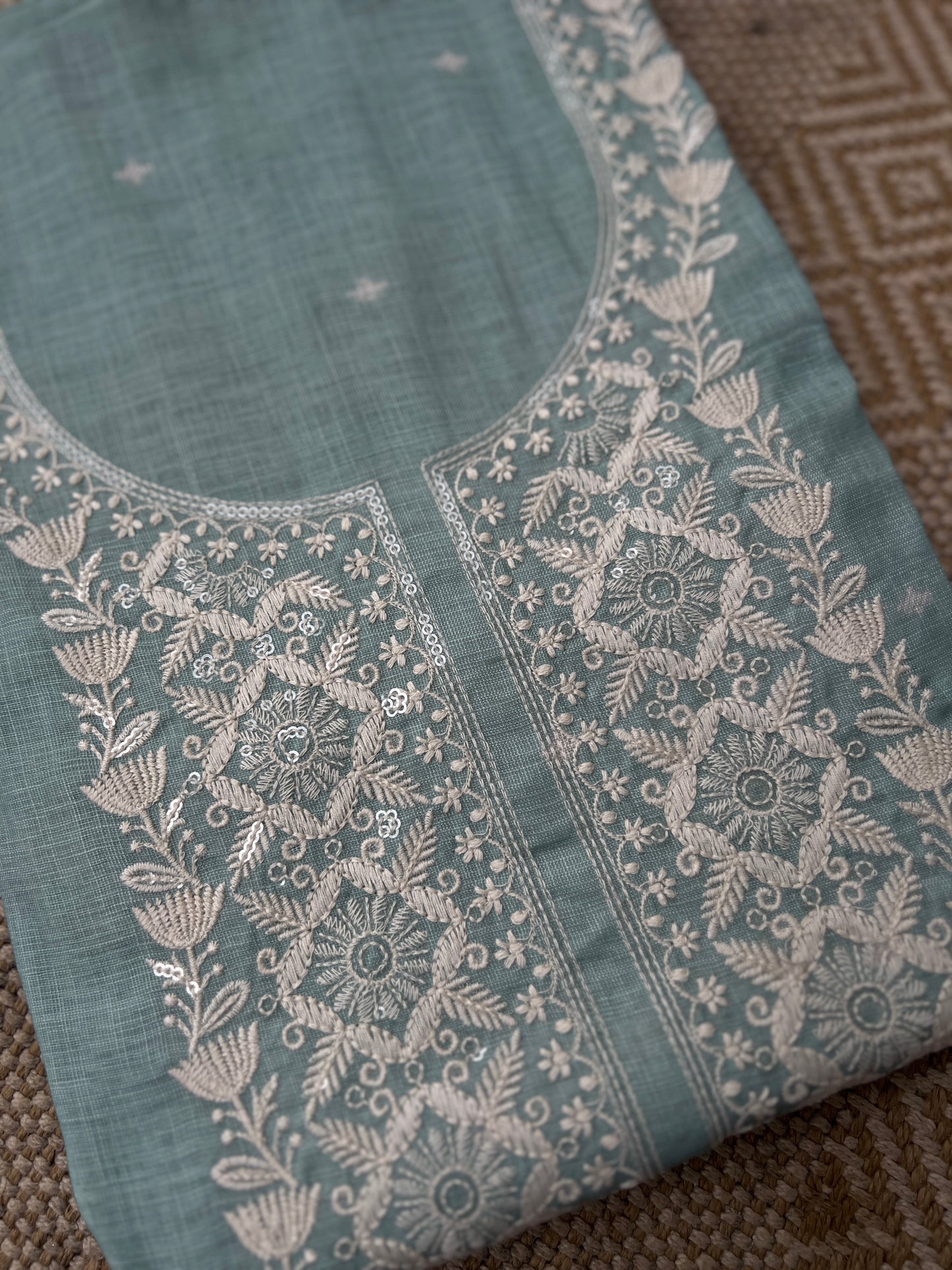 Soft-Toned Linen Sets with Intricate Thread Work
