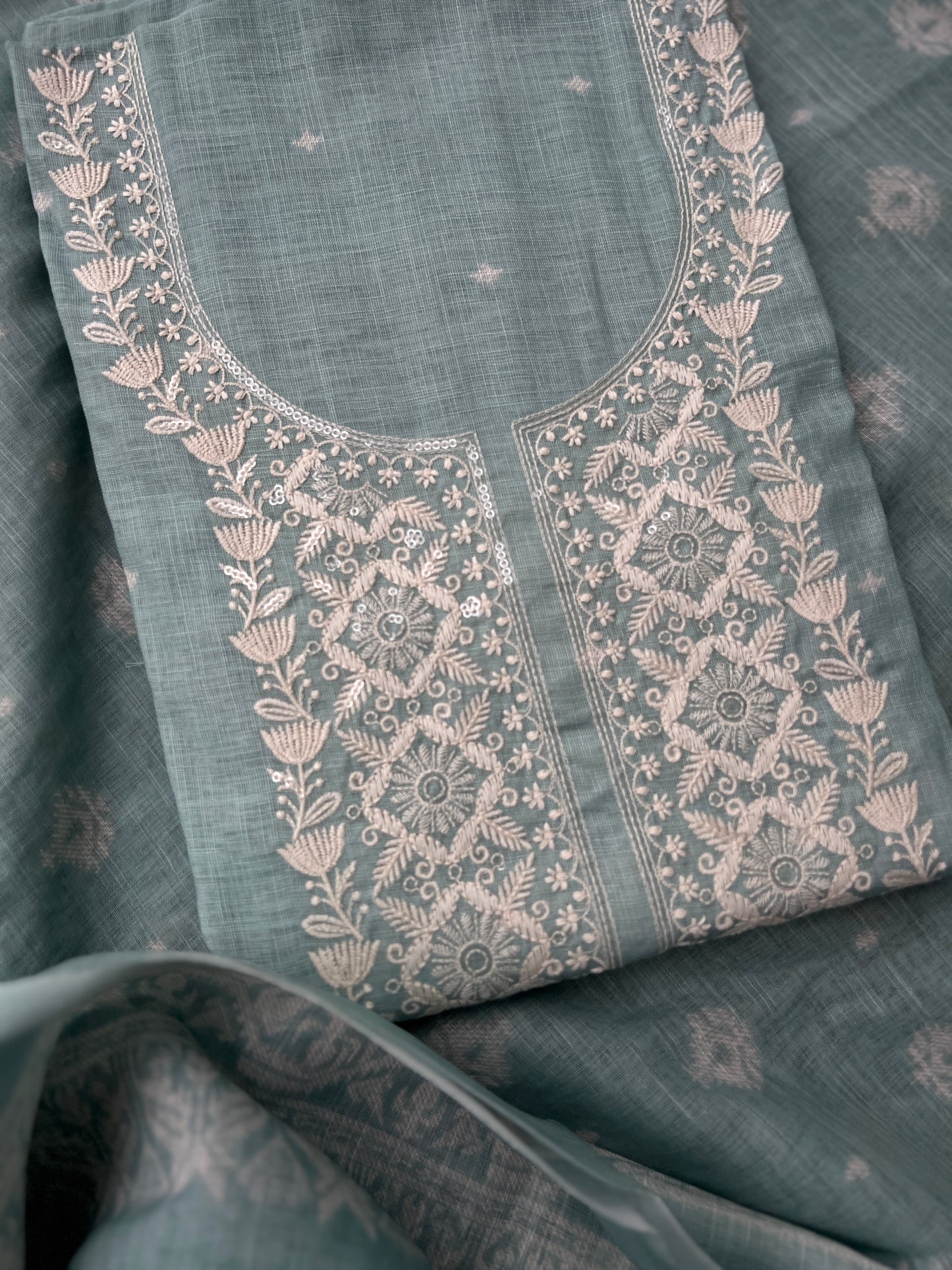 Soft-Toned Linen Sets with Intricate Thread Work