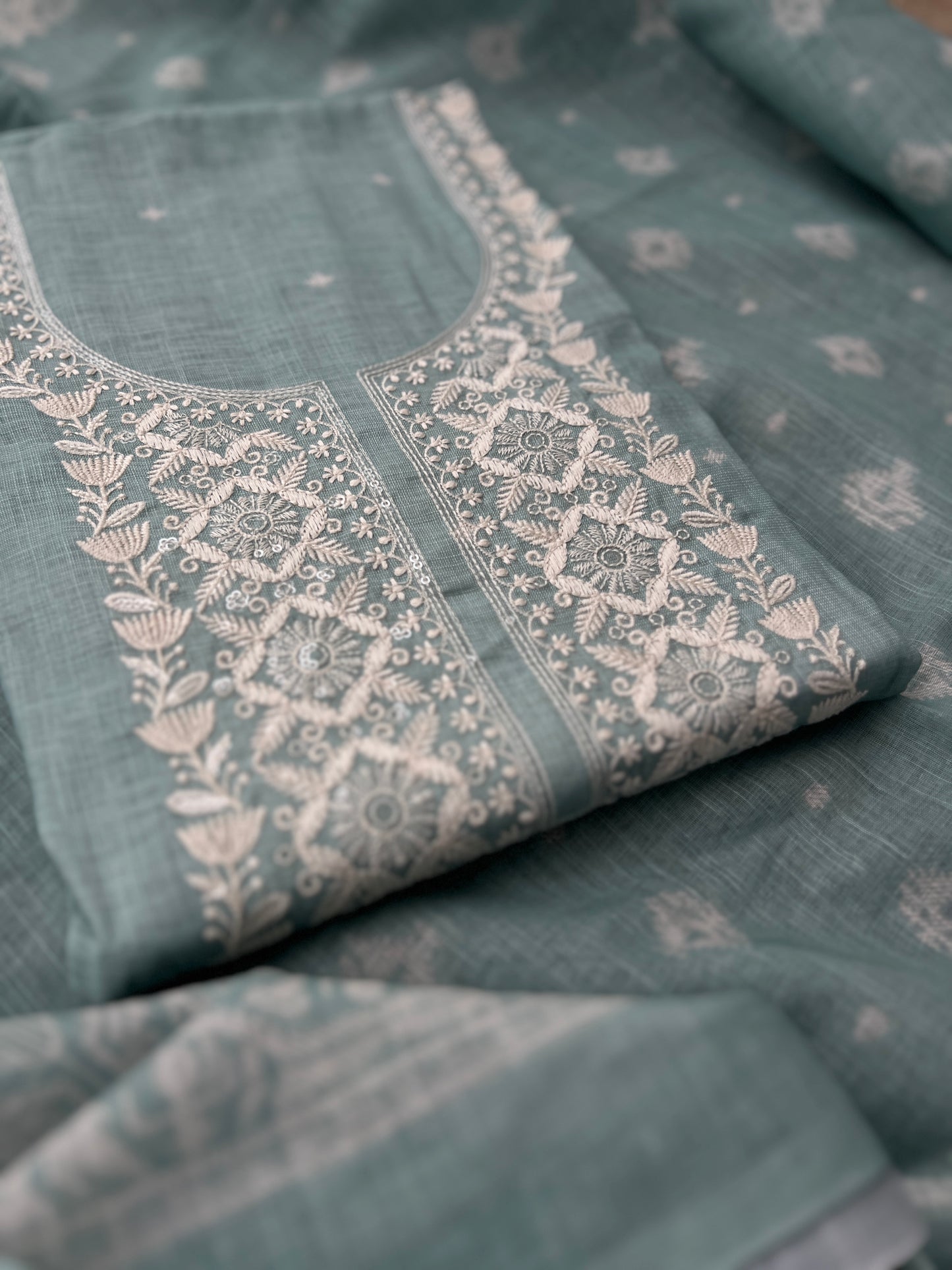 Soft-Toned Linen Sets with Intricate Thread Work