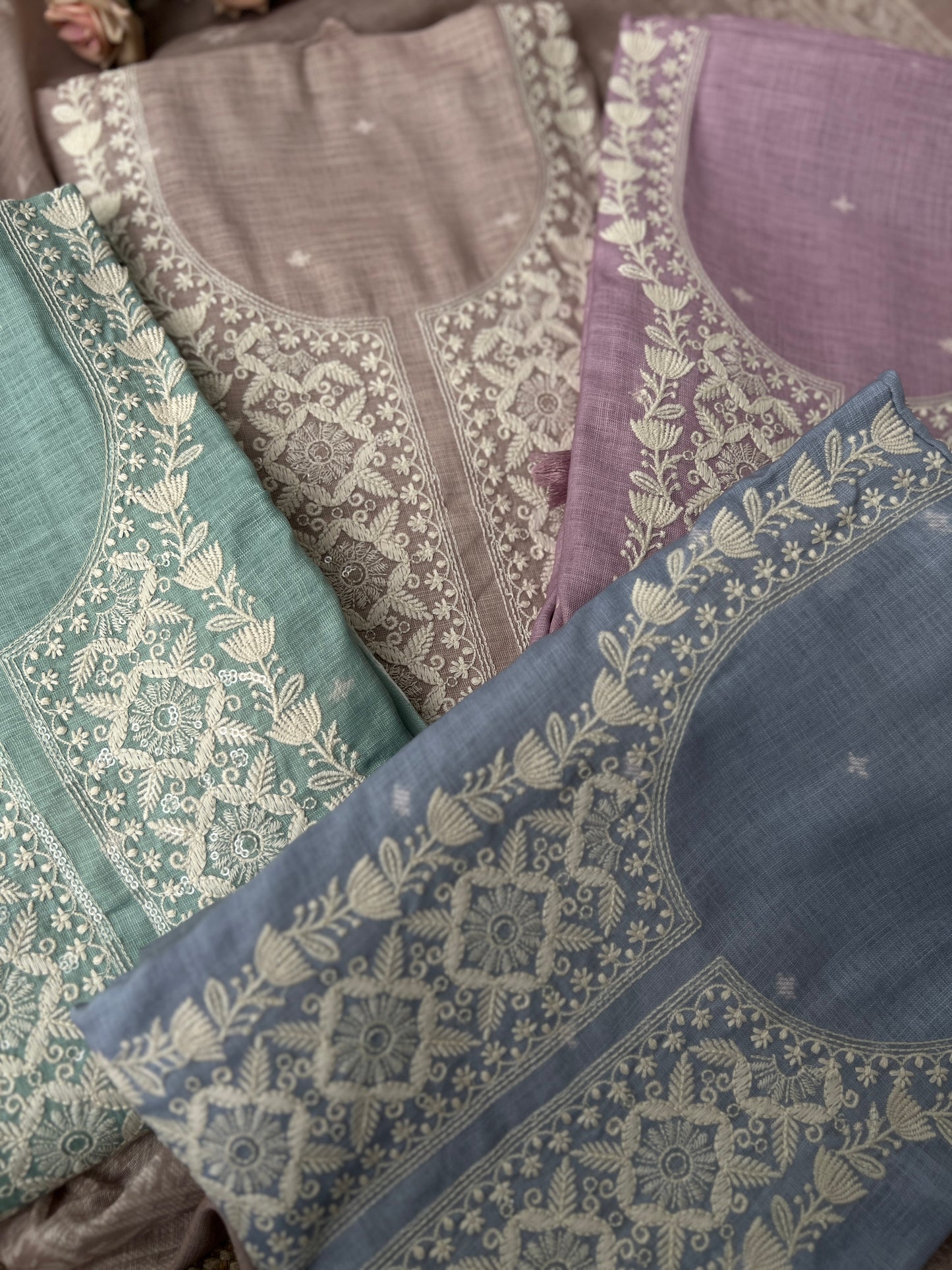 Soft-Toned Linen Sets with Intricate Thread Work