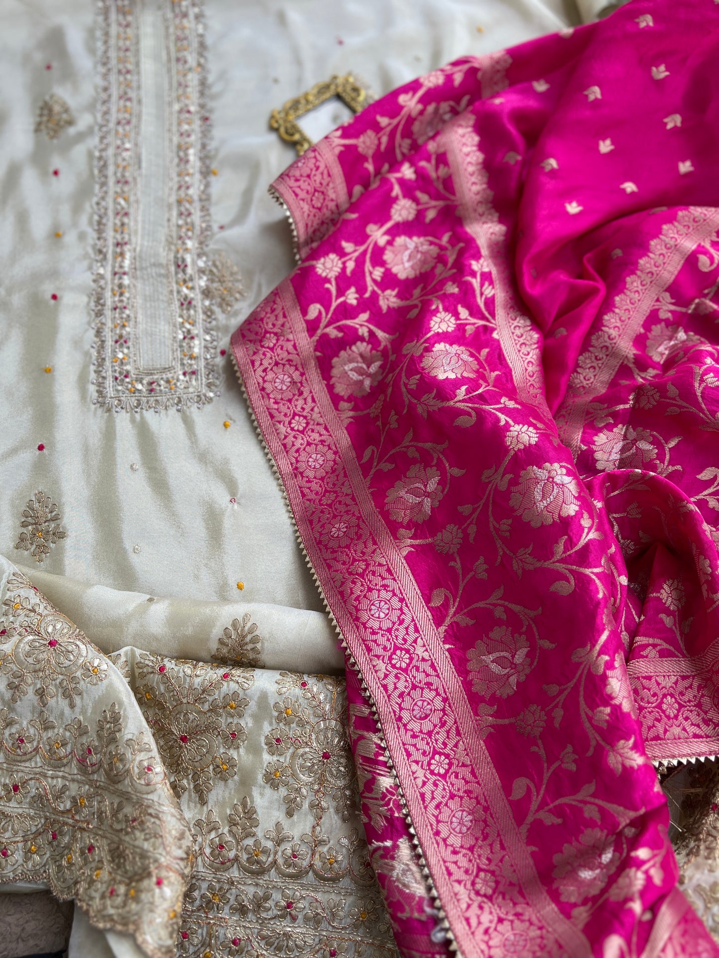 Ivory Shimmer Silk Suit with Hand Embroidery & Contrasting Dola Banarasi Dupatta