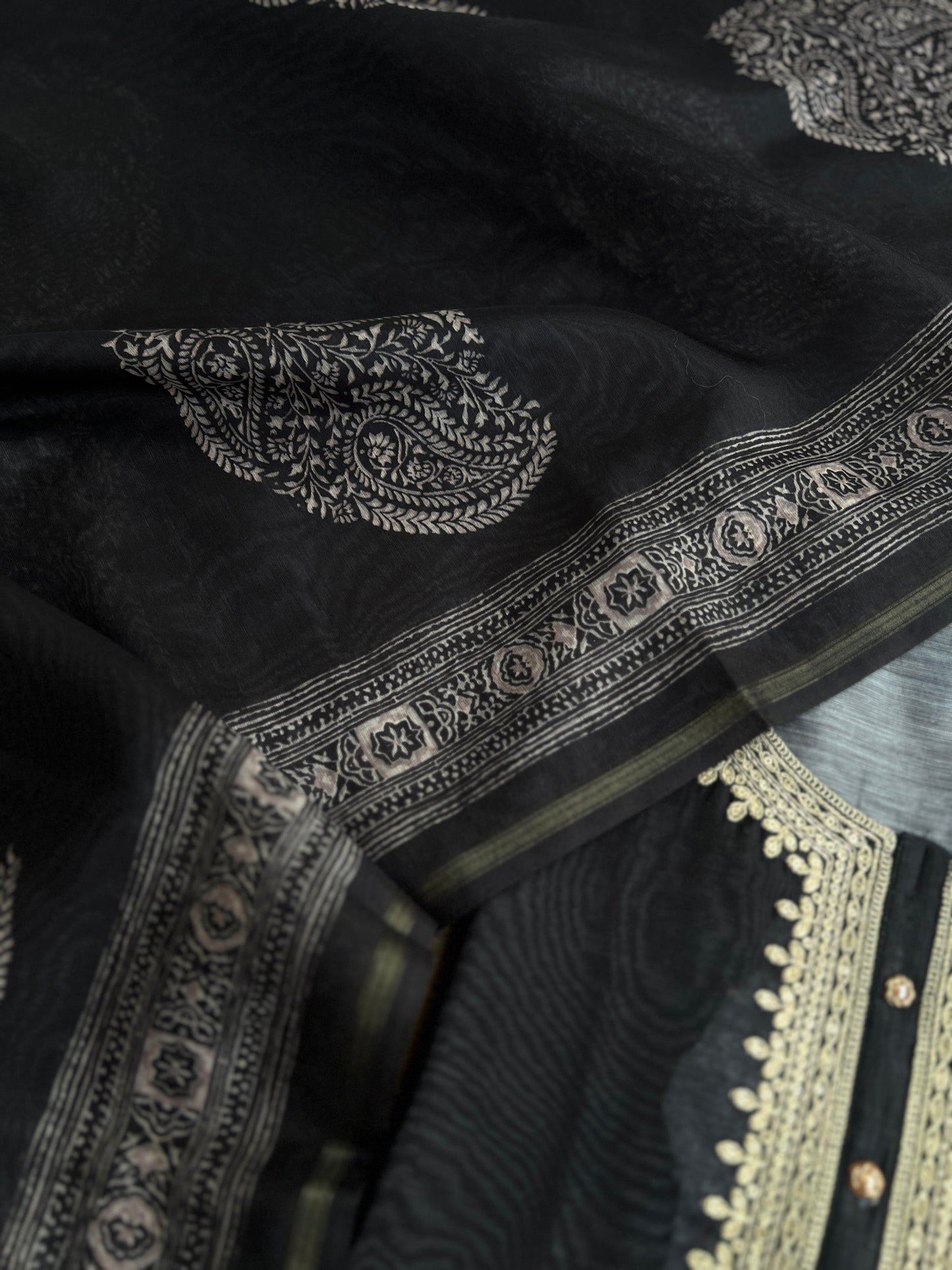 Graceful Black Chanderi Silk Suit with Intricate Coding Neck Works