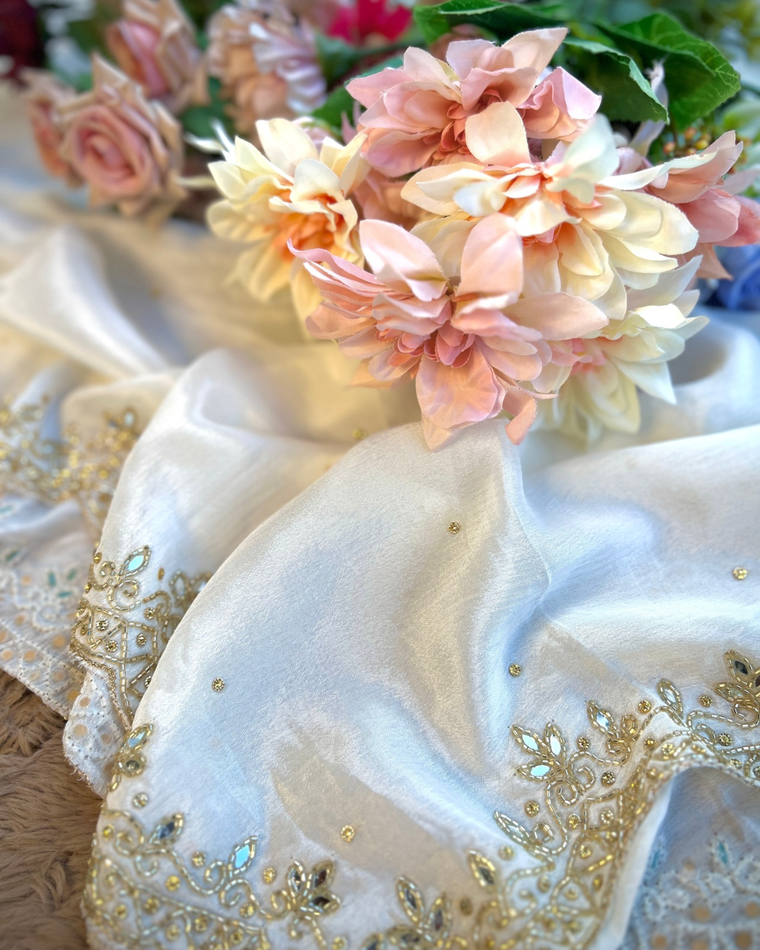 Pearl Glow β White Chinnon with Kalkatta Handwork