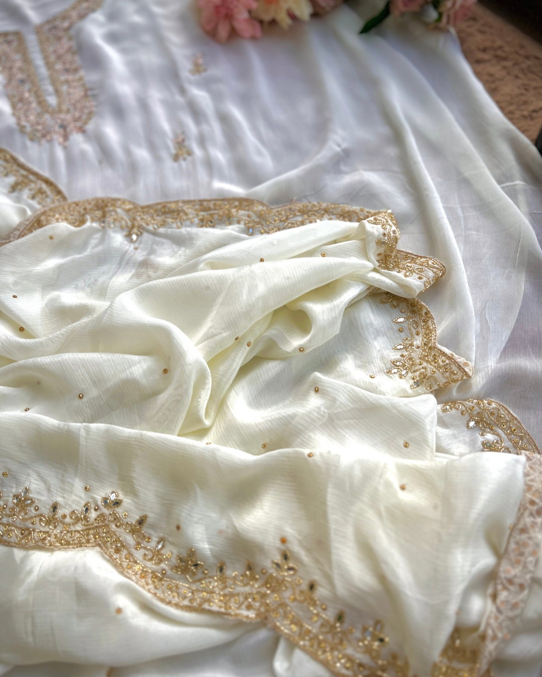 Pearl Glow β White Chinnon with Kalkatta Handwork