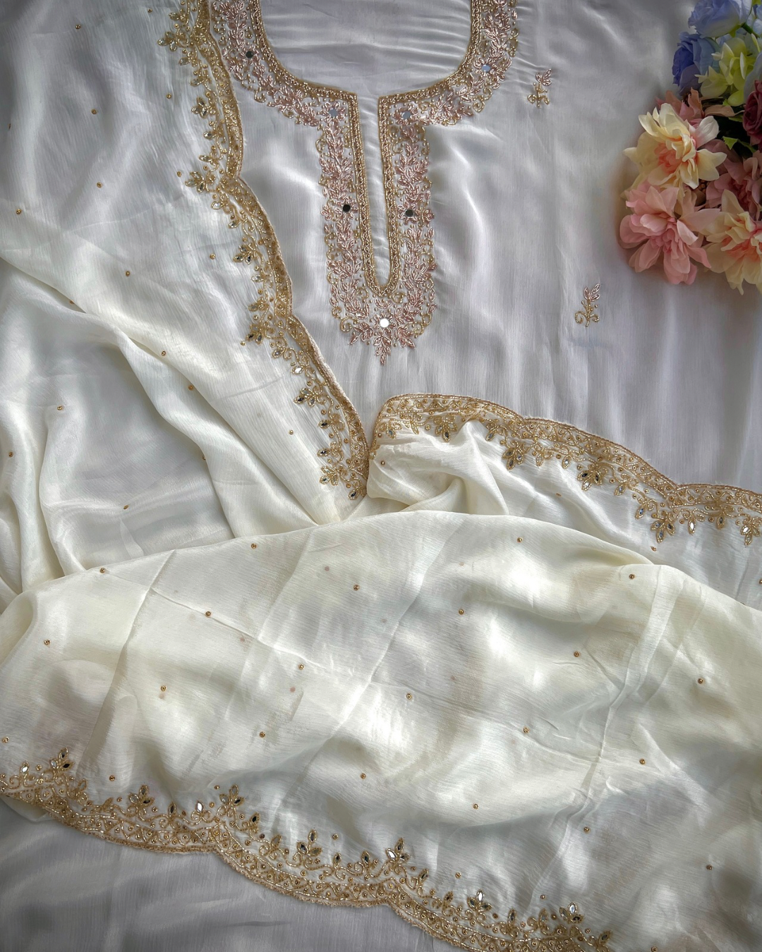 Pearl Glow β White Chinnon with Kalkatta Handwork