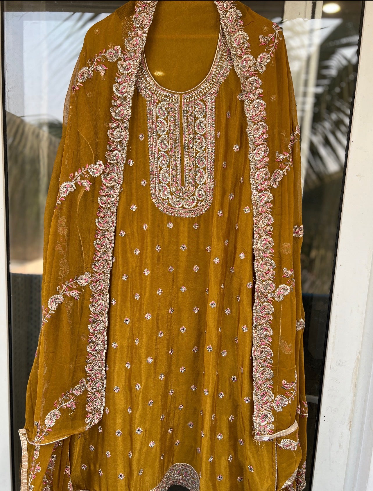 Elegant Chinnon Suit with Embroidered Neck & Daman