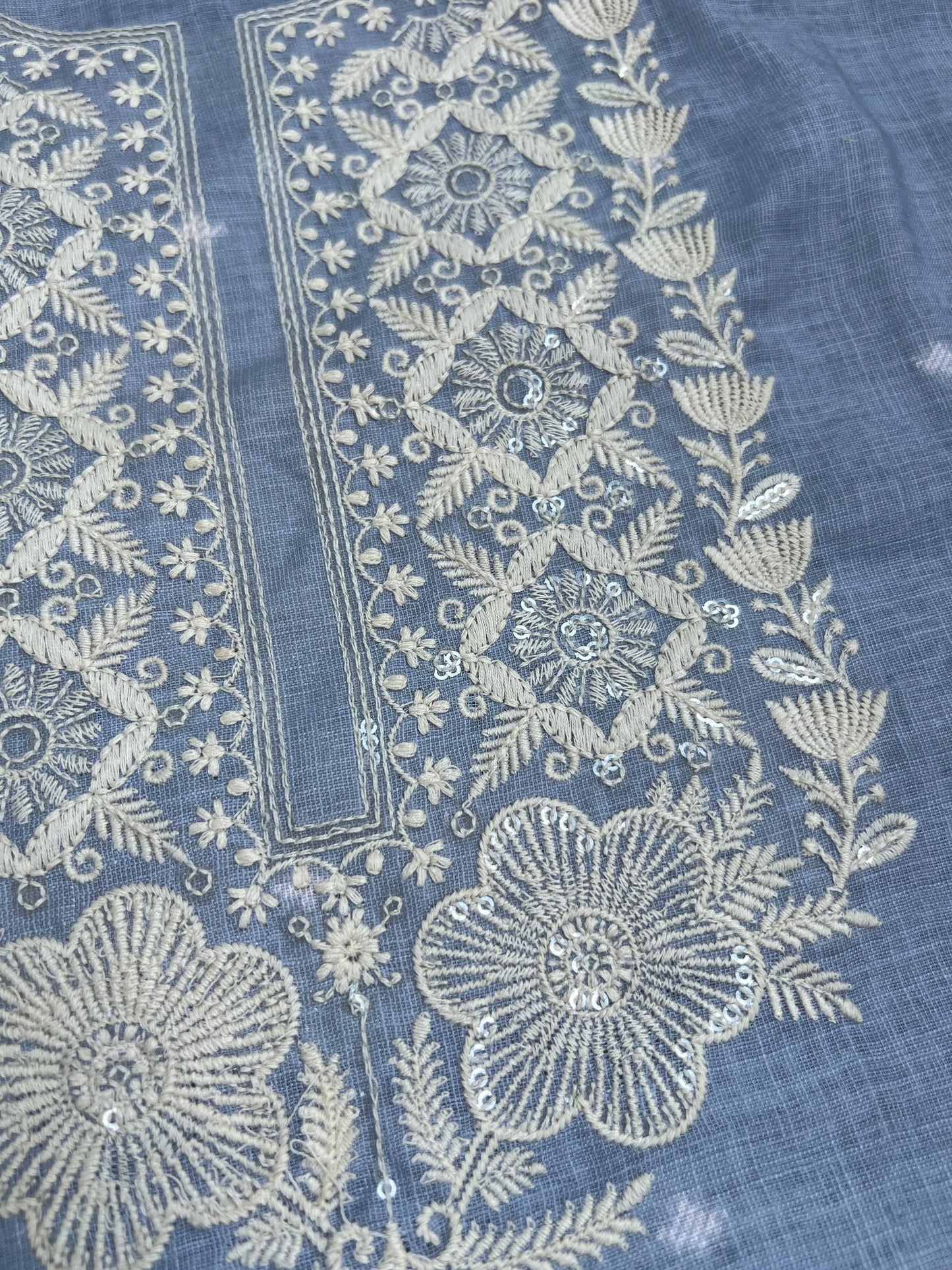 Soft-Toned Linen Sets with Intricate Thread Work