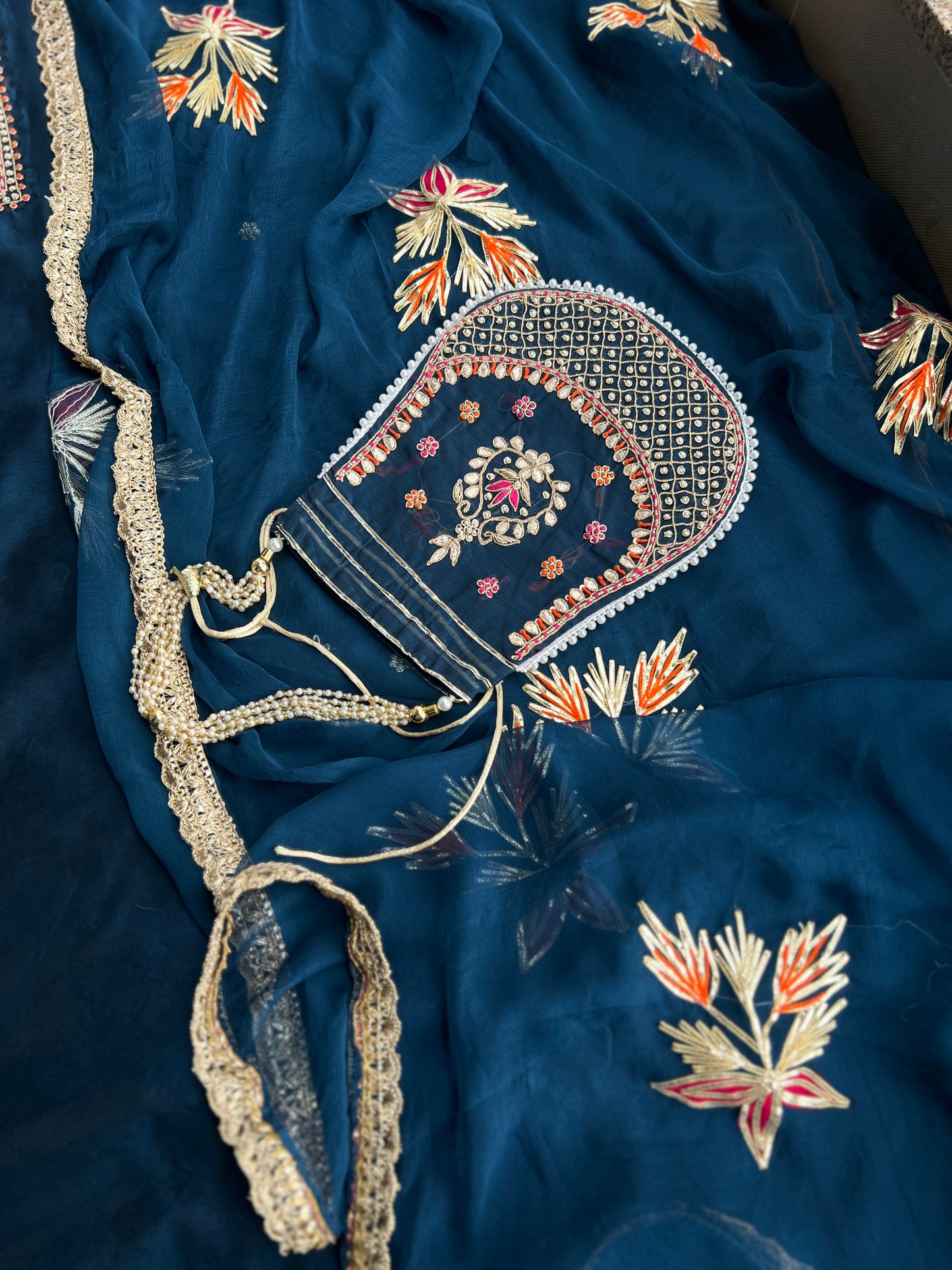 Chanderi Silk Elevated with Gota-Phool & Potli Details