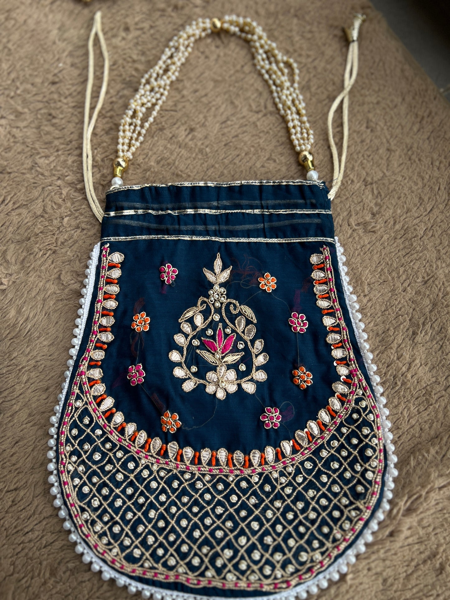 Chanderi Silk Elevated with Gota-Phool & Potli Details