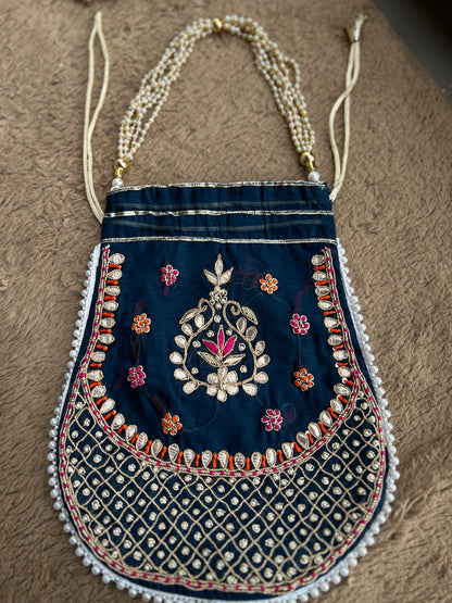 Chanderi Silk Elevated with Gota-Phool & Potli Details