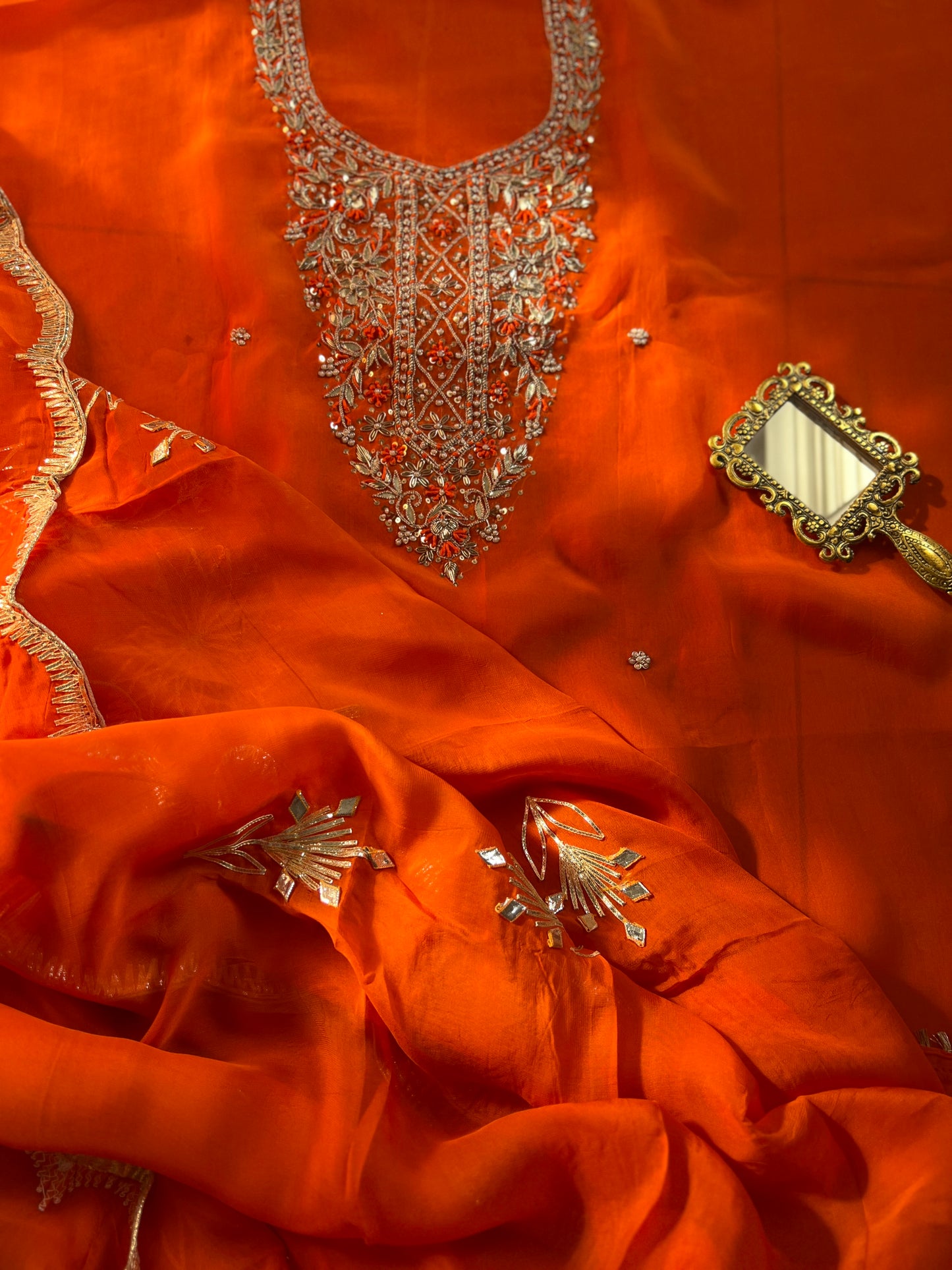 Fanta Orange Organza Ensemble with Handwork & Gotaphool Detailing