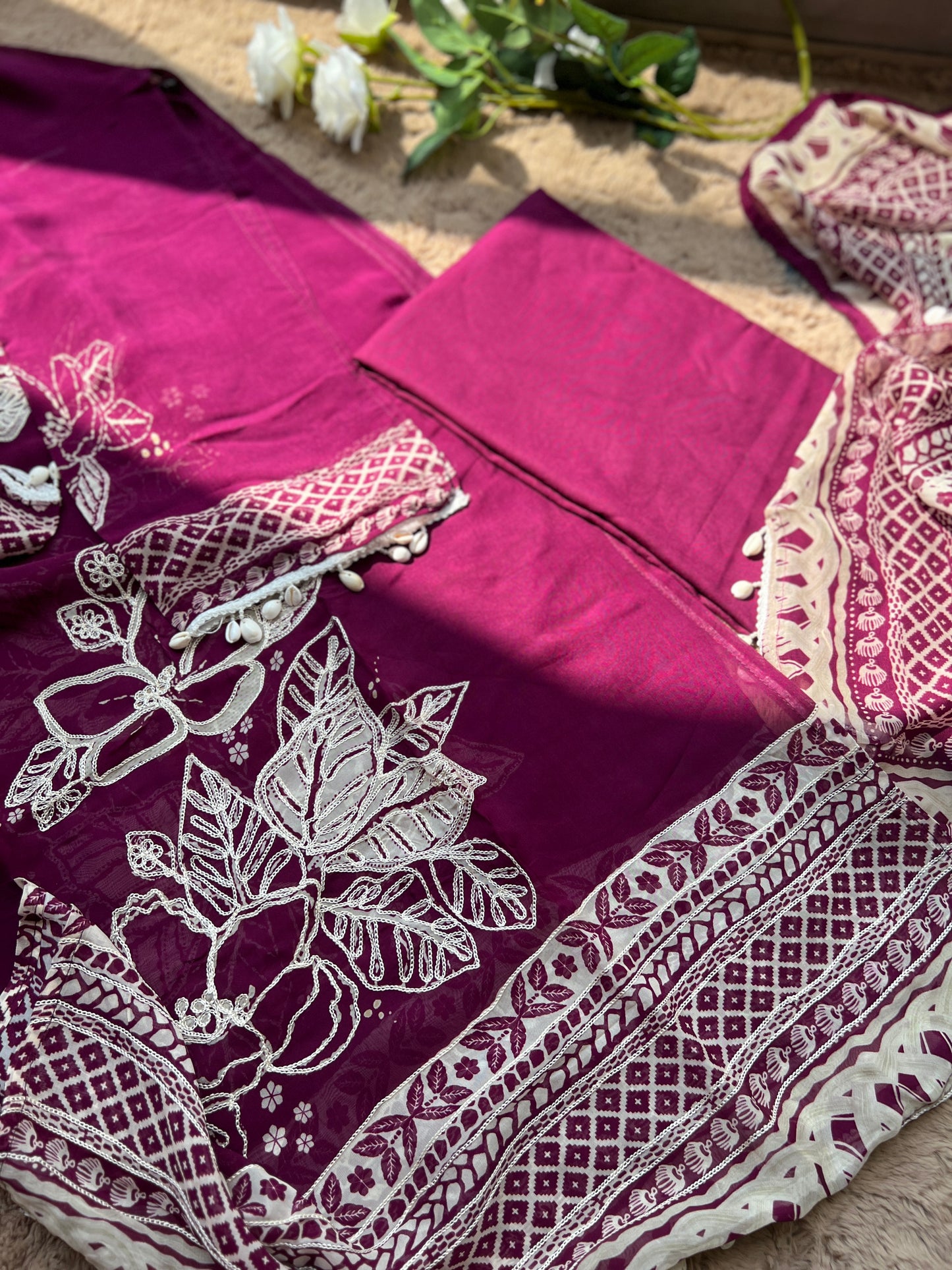 Magenta Muse: Pakistani Semi-Stitched Suit with Seashell Detailing