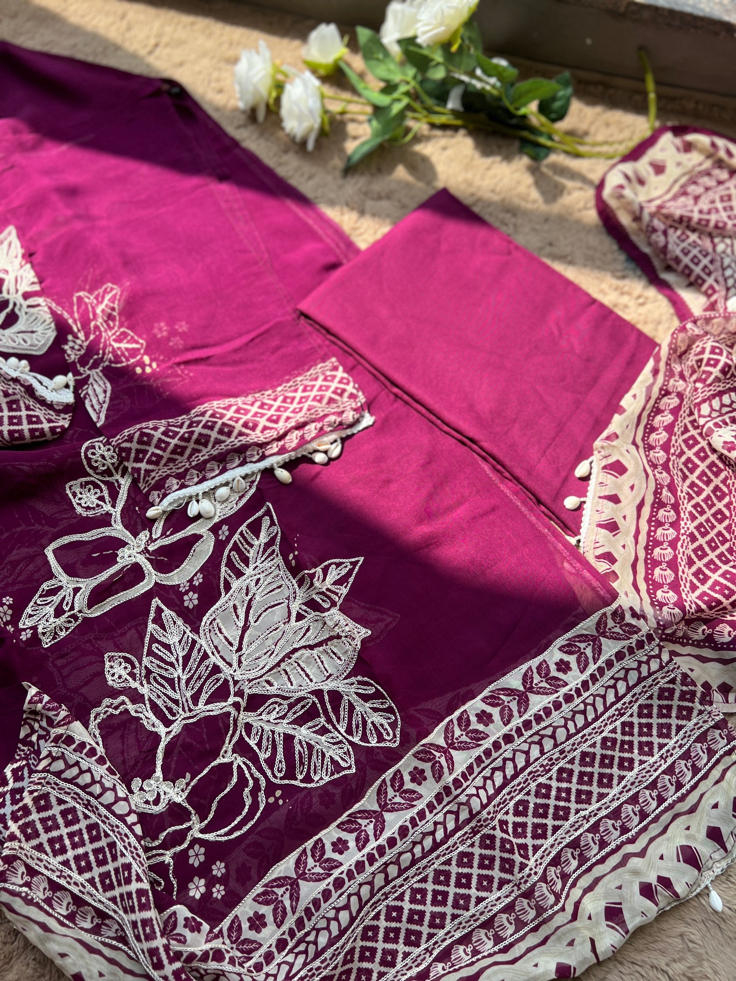 Magenta Muse: Pakistani Semi-Stitched Suit with Seashell Detailing