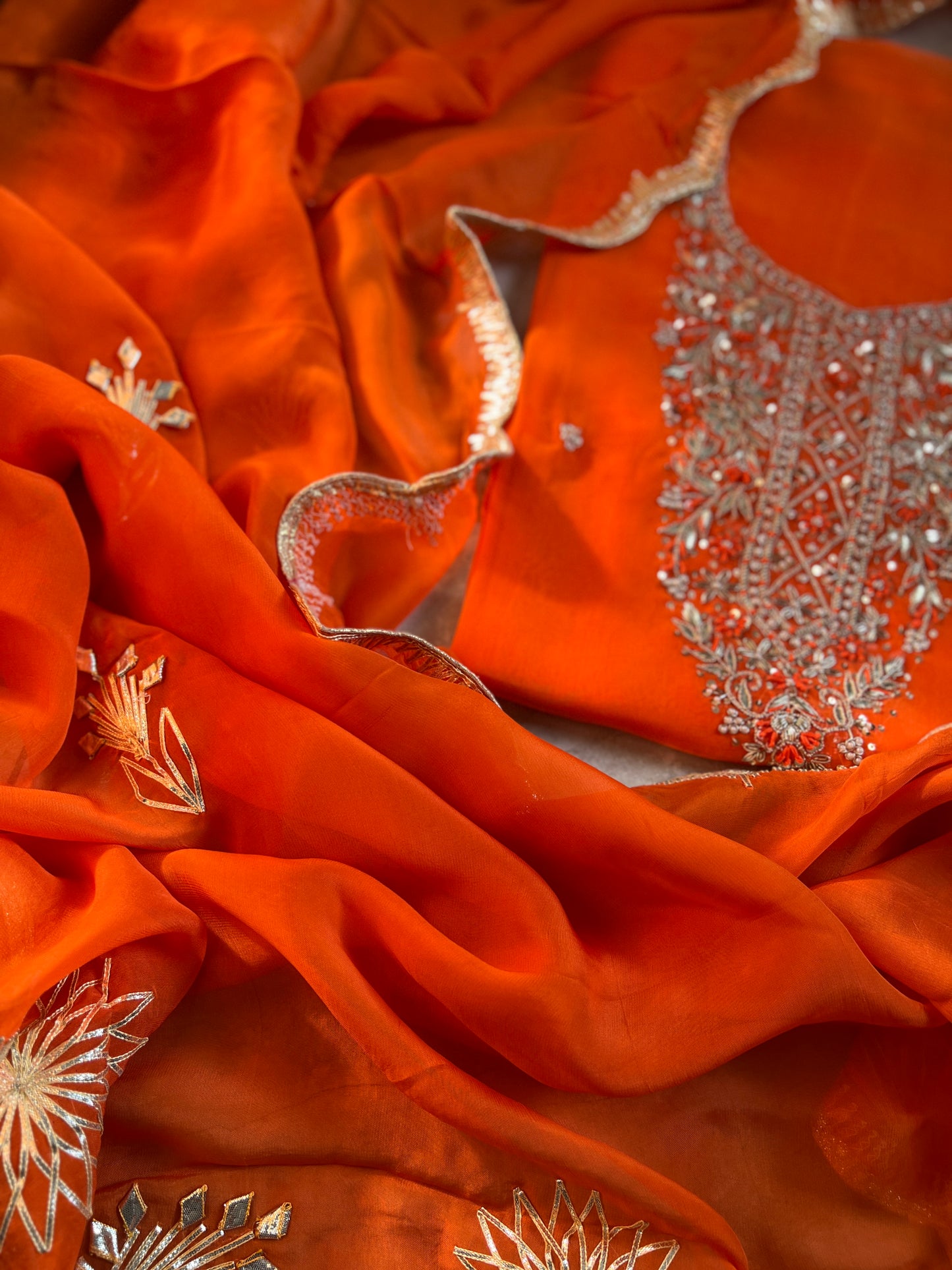 Fanta Orange Organza Ensemble with Handwork & Gotaphool Detailing