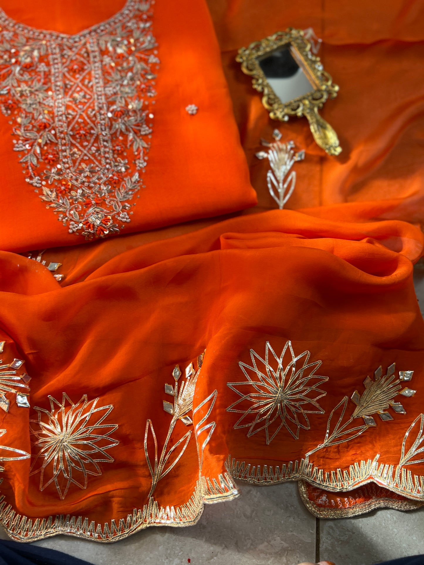 Fanta Orange Organza Ensemble with Handwork & Gotaphool Detailing